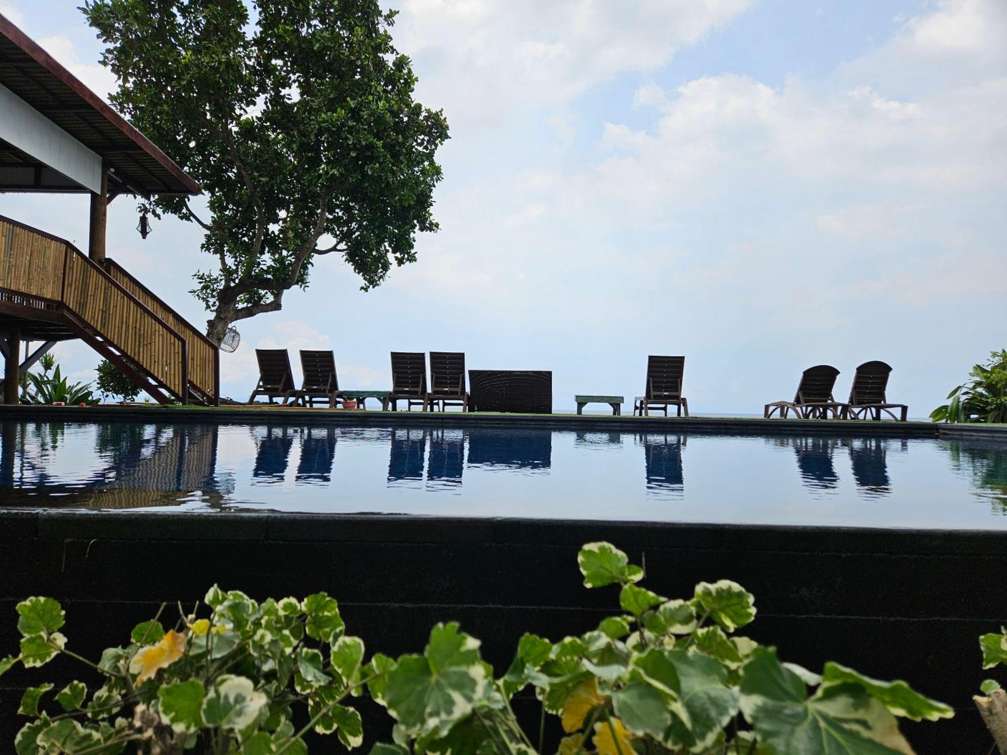 ซันเซ็ทเฮาส์-ลมโบะก์ Hotel Mangsit ภายนอก รูปภาพ